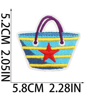 Detailed embroidery patch of beach handbag with red star and vibrant thread textures
