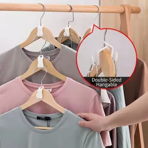 Space-saving white plastic hanger connector hooks with double-sided design for vertical stacking