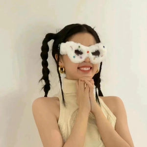 Trendy white plush cat-eye sunglasses with colorful rhinestones for a stylish look
