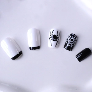 Halloween medium square press-on nails with black spider and cobweb French designs