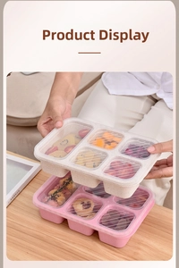 Close-up of a 6-compartment wheat straw lunch box filled with fresh fruit and snacks