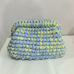 Handmade woven crochet cloud clutch bag in light blue and yellow chunky cotton knit