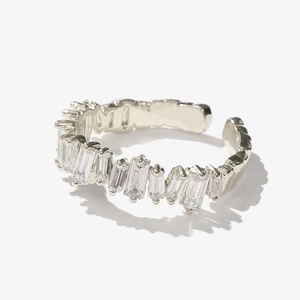 Macro detail of silver adjustable ring with pavé rectangle cubic zirconia stones
