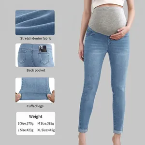 Slim fit light blue maternity jeans with stretch grey high-waist abdominal support band