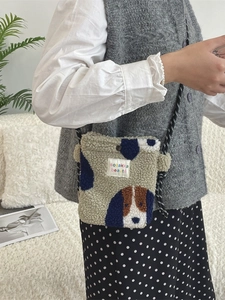 Plush beige faux fur crossbody bag with cute dog prints and a patterned rope strap