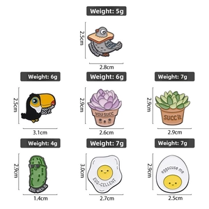 Detailed view of fun cartoon enamel pins with weight and size specifications