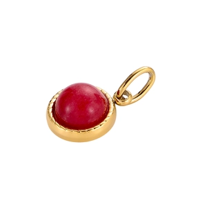 Detail of red round birthstone pendant with gold braided metal frame for DIY jewelry