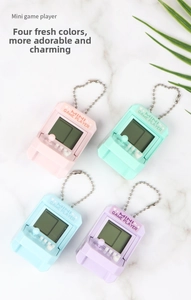 Miniature retro arcade game consoles in pastel colors with metal keychains and LCD screens