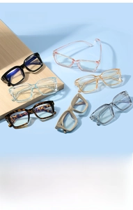 Flat lay of stylish square blue light blocking glasses in multiple vibrant colors