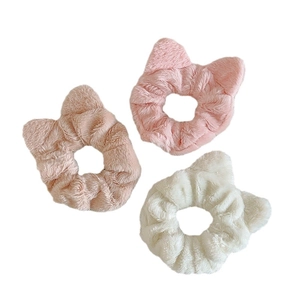 Cute plush cat ear scrunchies in pink, beige and white colors for women hair styling