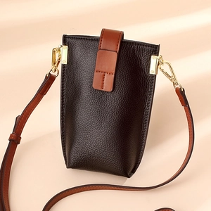 Minimalist genuine leather crossbody phone bag in brown color-block with shoulder strap