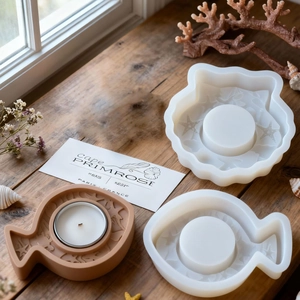 Silicone candle holder mold featuring embossed starfish and seashell shapes for DIY crafts