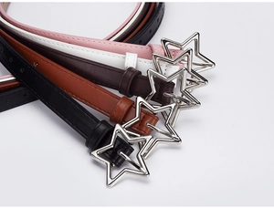 Detailed shot of star-shaped silver buckles on thin leather belts in multiple colors