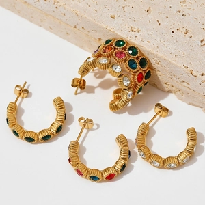 Gold C-shaped zircon earrings with striped metal texture and multicolored stones