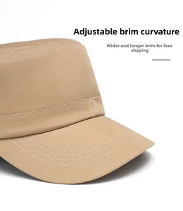 Close-up of khaki flat top cap featuring adjustable brim and durable cotton twill fabric