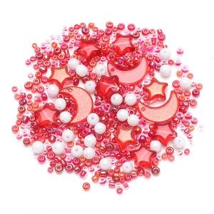 DIY jewelry kit with colorful star, moon and round beads for bracelets and earrings