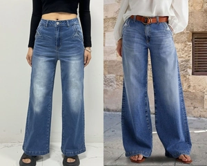 Détail de jean taille haute à jambe large avec broderie étoile sur les poches et délavage vintage