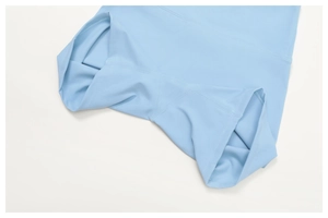 Macro shot of light blue yoga leggings featuring smooth four-needle six-thread flatlock seams