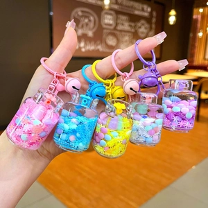 Colorful gas tank liquid quicksand keychains with sequins and bells in 5 vibrant colors