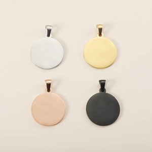 Set of four round stainless steel pet ID tags in silver, gold, rose gold, and black colors