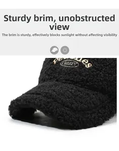Detail of black faux shearling baseball cap with CHIZZY embroidery and textured finish