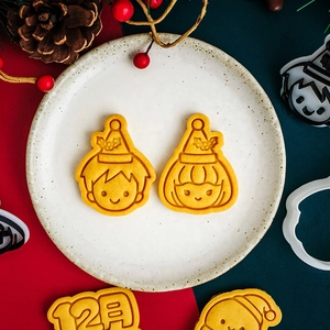 Mini Christmas cookie cutters with cute cartoon character shapes for holiday baking parties