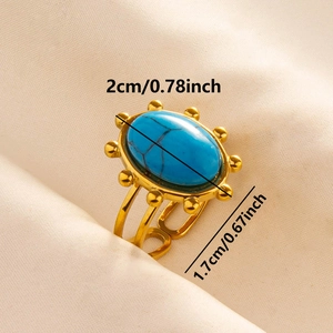 Macro detail of adjustable gold ring with oval turquoise stone and boho bead border
