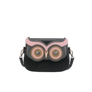 Creative owl-shaped black PU leather crossbody bag with pink eyes and golden metallic beak