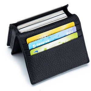 Detail view of black lychee leather card holder with multiple functional storage slots