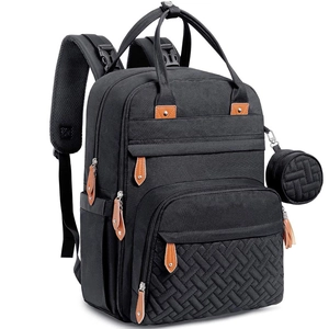 Side view of multi-functional black mommy diaper backpack with woven texture and small pouch