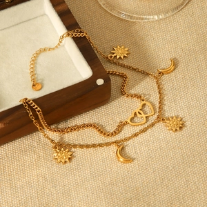 Double-layered 18K gold plated stainless steel anklet with sun, moon, and heart charms