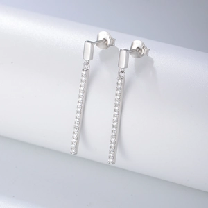 Detail view of S925 sterling silver geometric drop earrings with sparkling white zircons