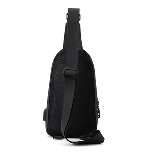 Minimalist black business chest bag with breathable mesh back and external USB port