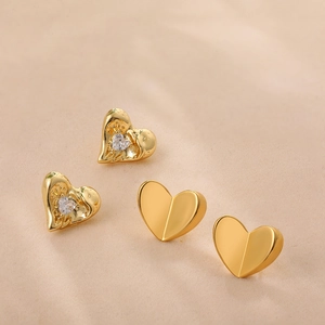 18K gold heart button earrings featuring cubic zirconia with a textured molten design