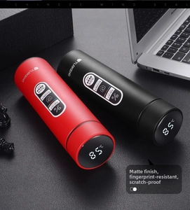Detail of smart stainless steel thermos lid showing LED temperature display on matte finish