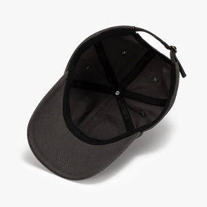 Internal view of charcoal grey cotton baseball cap with sweatband and adjustable metal buckle