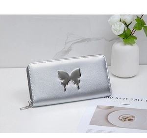Silver long wallet featuring a liquid metal butterfly accent and smooth metallic finish