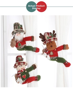Close-up of plush Santa, Reindeer and Snowman curtain buckles in festive plaid fabric