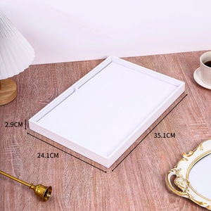 Detail view of the white jewelry display tray with dimensions 35.1 x 24.1 x 2.9 cm