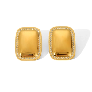 Detail shot of gold-plated square stud earrings with sparkling white crystals