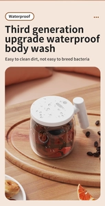 Detail showing waterproof glass electric self-stirring mug with water droplets and handle