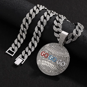 Hip hop silver Cuban chain with iced out GO GO GO round baseball pendant on black background
