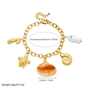 Gold-plated beach bracelet with sea shell charms, seahorse and turtle pendants