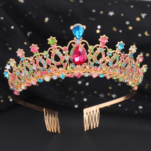 Detailed close-up of a vintage golden bridal crown with colorful crystal rhinestones