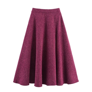 Detailed texture of burgundy A-line tweed midi skirt with high-quality woven fabric detail