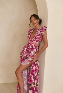 Detail of pink floral maxi dress with deep V-neck, ruffle straps and side split