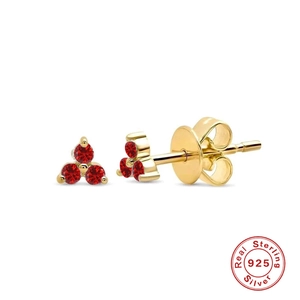 Close-up of S925 sterling silver four-leaf clover earrings with red stones and gold plating
