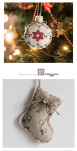 Macro view of rustic burlap Christmas ornaments with red and green floral print