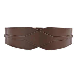 Detail of wide dark brown leather waist belt with diamond stitching and rich texture