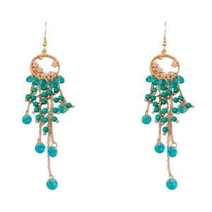 Ethic bohemian gold tassel earrings with turquoise beads and sparkling cubic zirconia